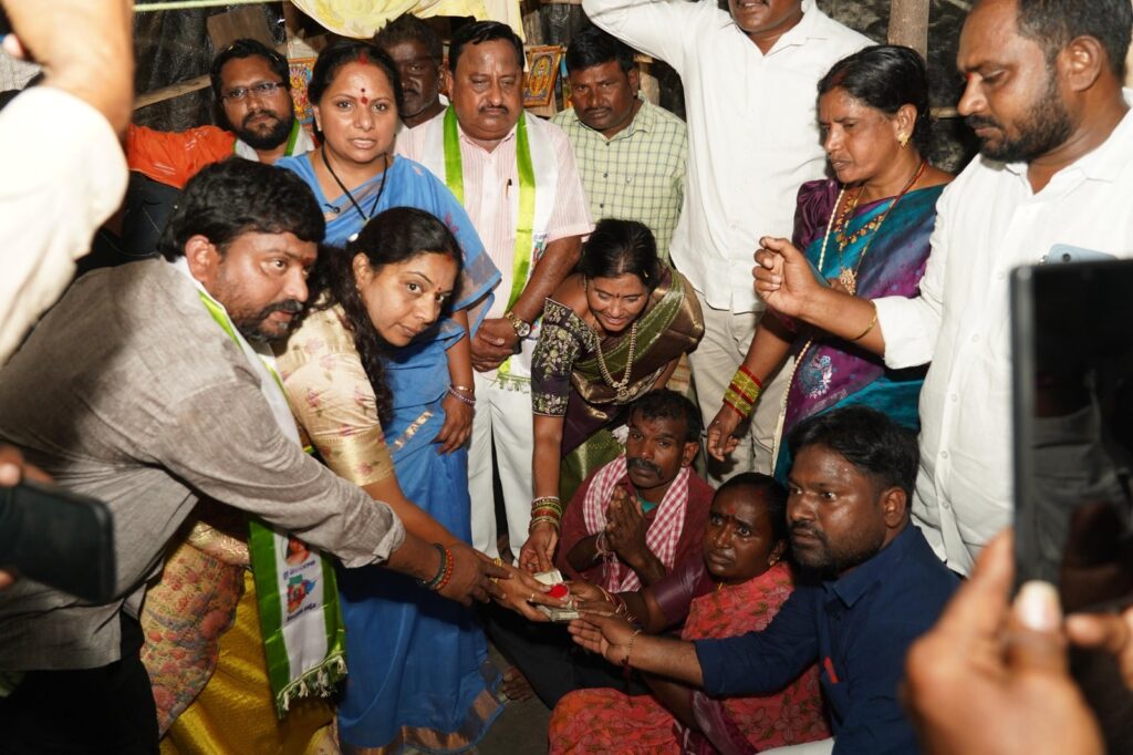 Kavitha with Warangal flood victims